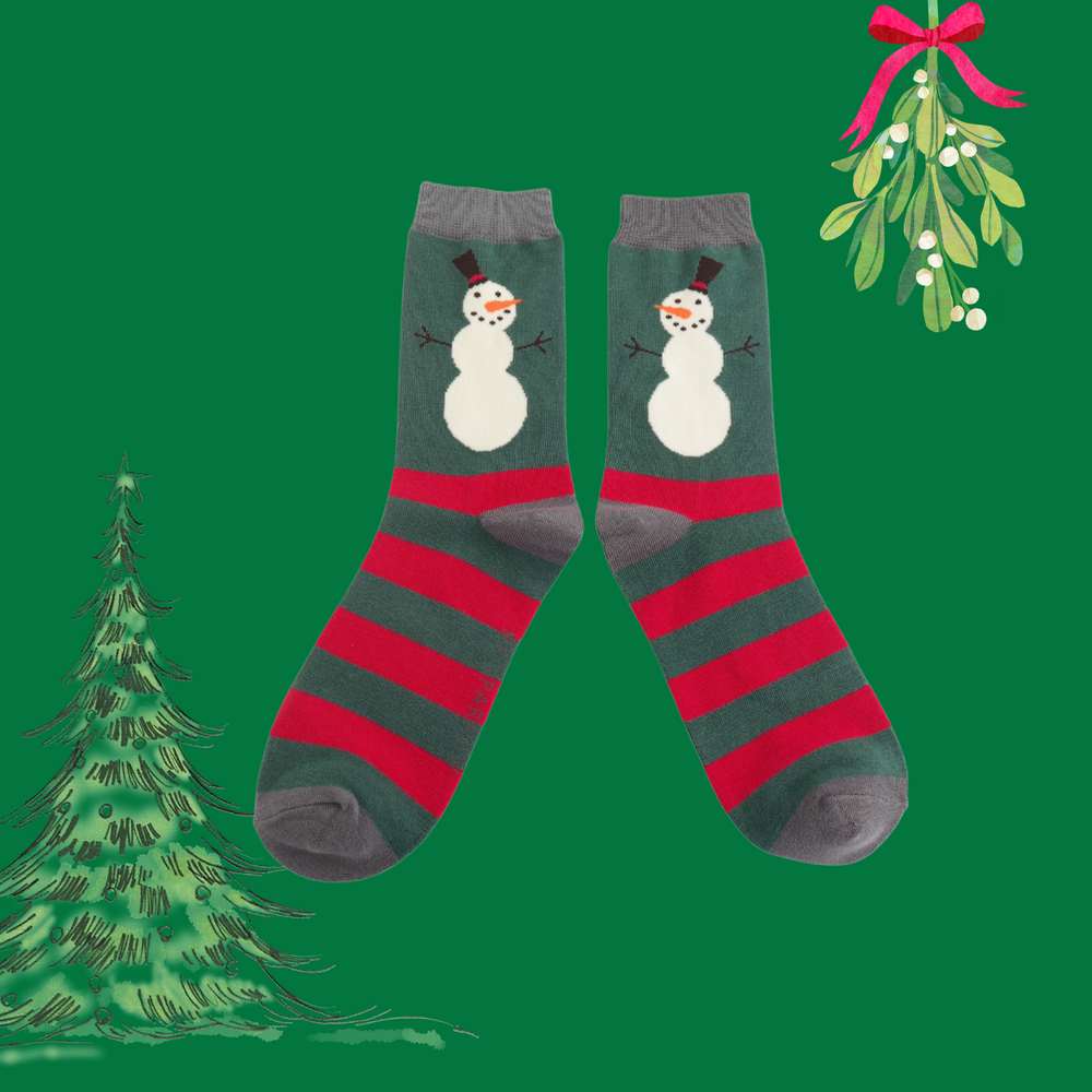 A pair of socks with a festive snowman motif. Striped red and green legs. Grey hee, to and cuff. 