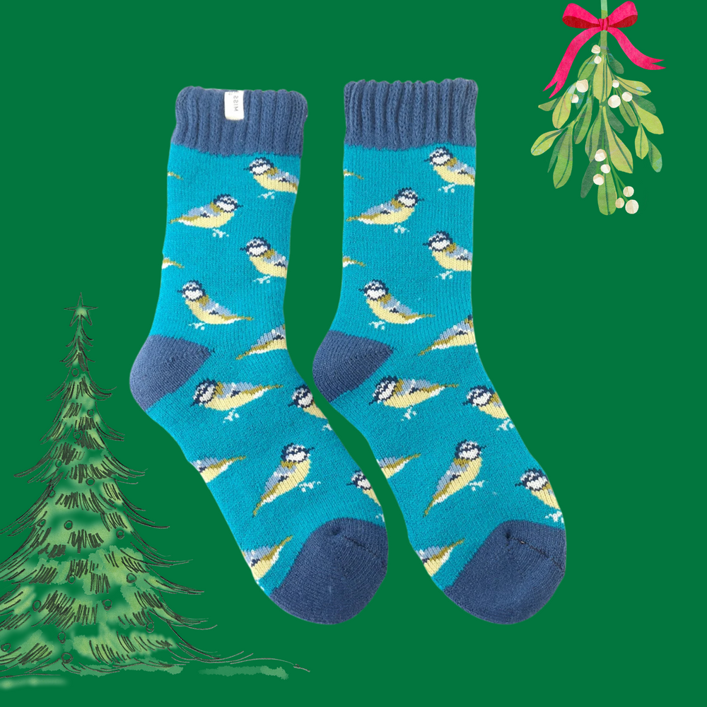 A pair of socks depicting blue tits. Blue legs, dark blue toes, heel and cuffs. 