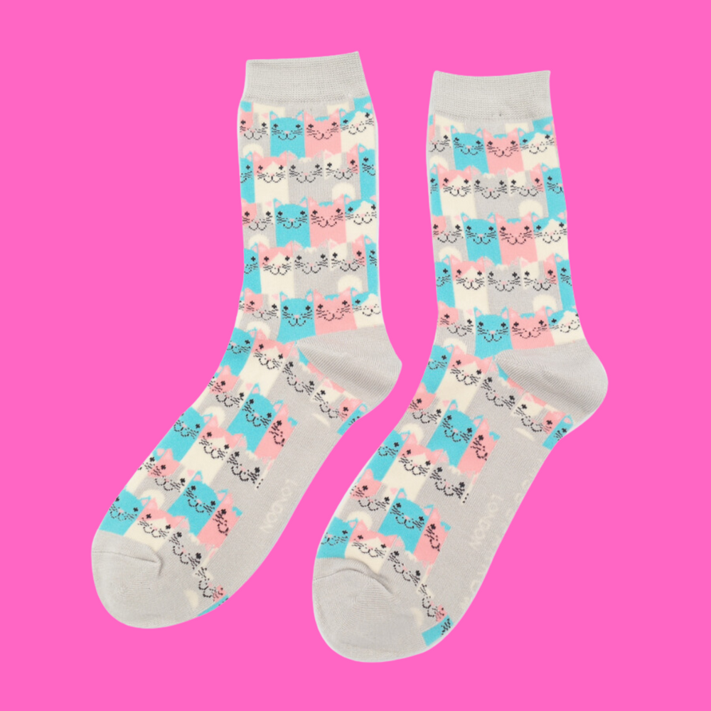 
                  
                    A pair of socks with a multicoloured happy anime cat pattern. Grey heel, toe and cuff.
                  
                