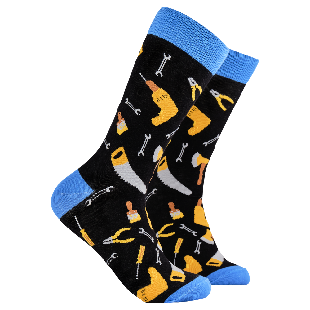 DIY Socks - Handy Andy. A pair of socks depicting DIY tools. Black legs, blue cuff, heel and toe.