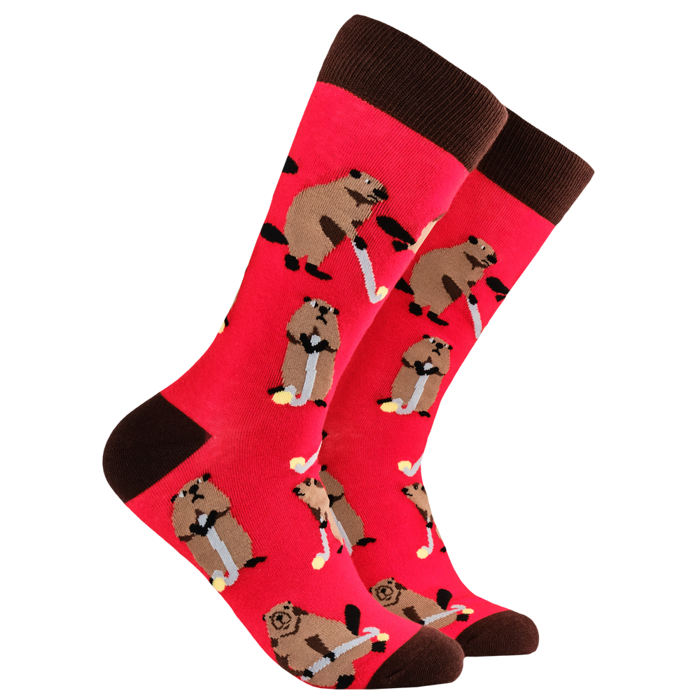 Beaver Socks - Hockey Beaver. A pair of socks depicting a beaver playing hockey. Red legs, brown heel, toe and cuff. 