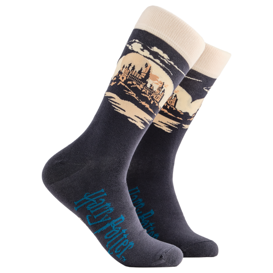 Harry Potter Socks - Hogwarts. A pair of socks depicting Hogwarts Castle. Grey legs, cream cuff, grey heel and toe.