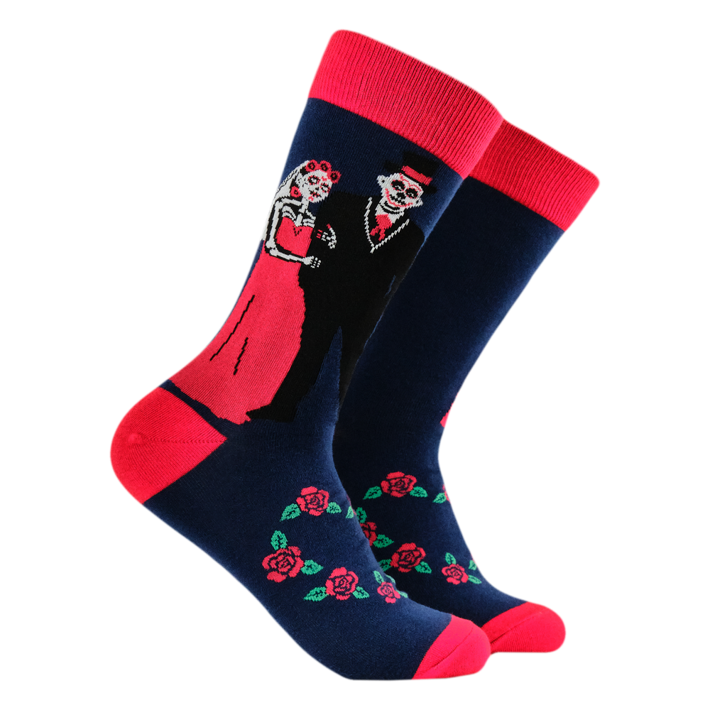 Just Married Socks. A pair of socks with a day of the dead motif. Dark blue legs, red heel, toe and cuff. 