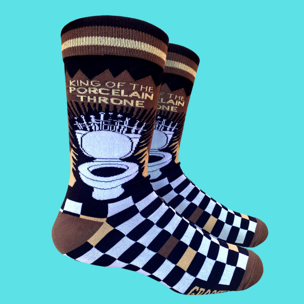 A pair of socks depicting a toilet and a striking blue and black checked pattern. Brown toes, heel and cuff.