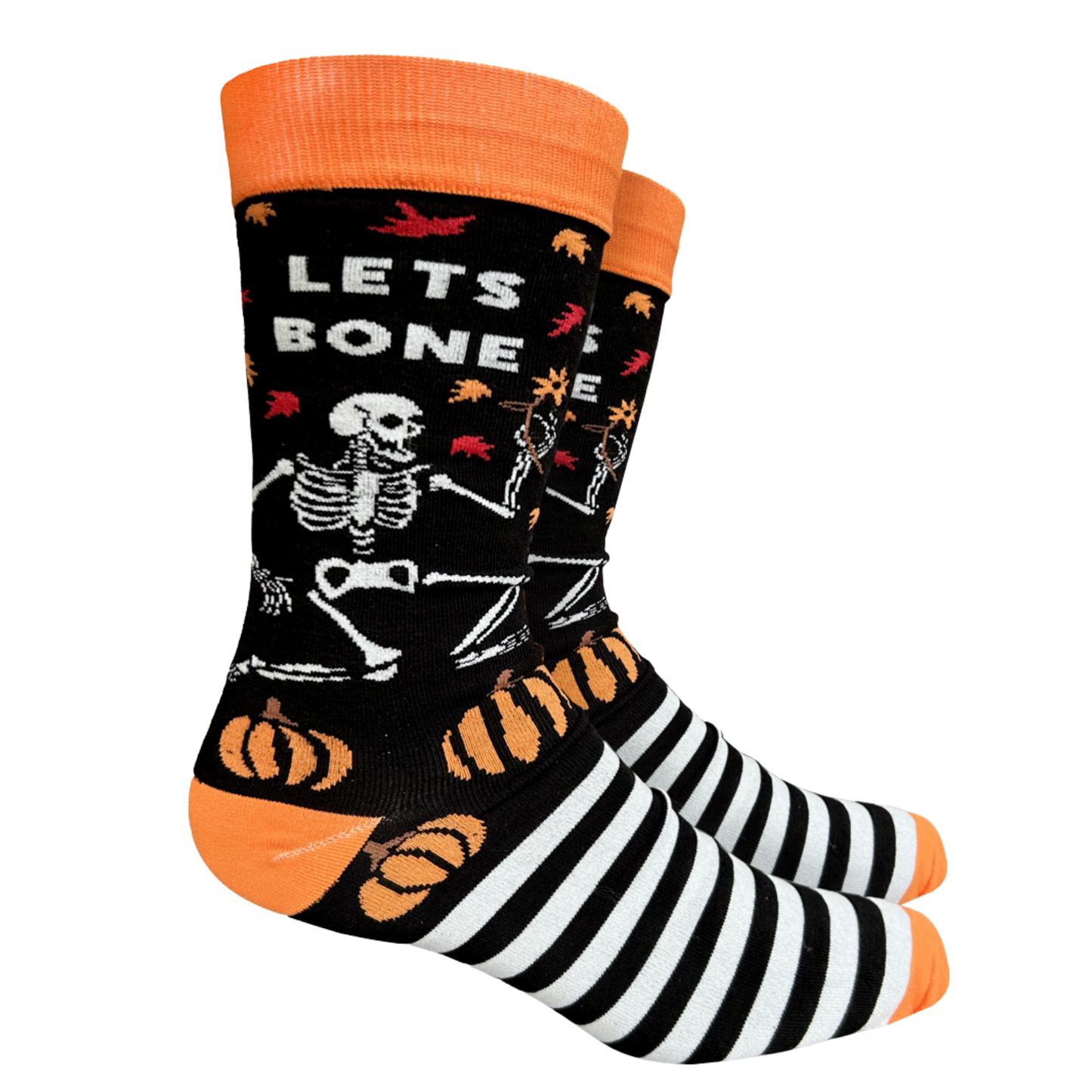 Let's Bone Socks - Large. A pair of socks depicting a dancing skeleton and a bold slogan. Black and white stripes and halloween motifs. Orange toe, cuff and heel. 