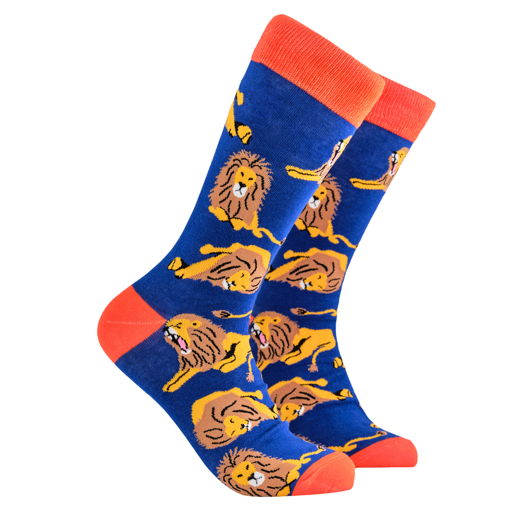 Lion Socks - Lioning Around. A pair of socks depicting lions. Blue legs, red cuff, heel and toe.