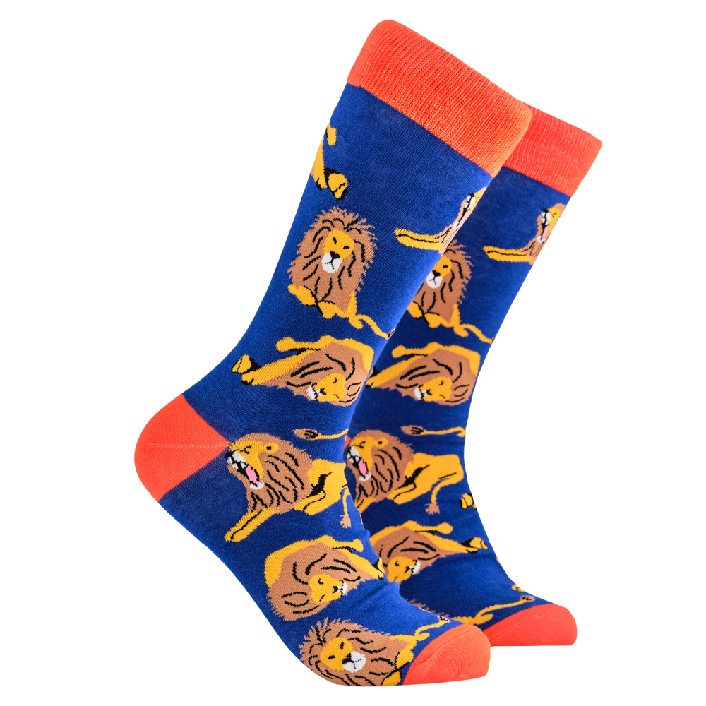 
                  
                    Lion Socks - Lioning Around. A pair of socks depicting lions. Blue legs, red cuff, heel and toe.
                  
                