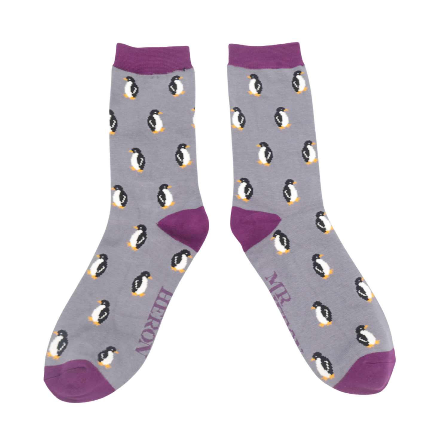 
                  
                    A pair of socks with a penguin pattern. Grey legs, purple heel, cuff and toe.
                  
                