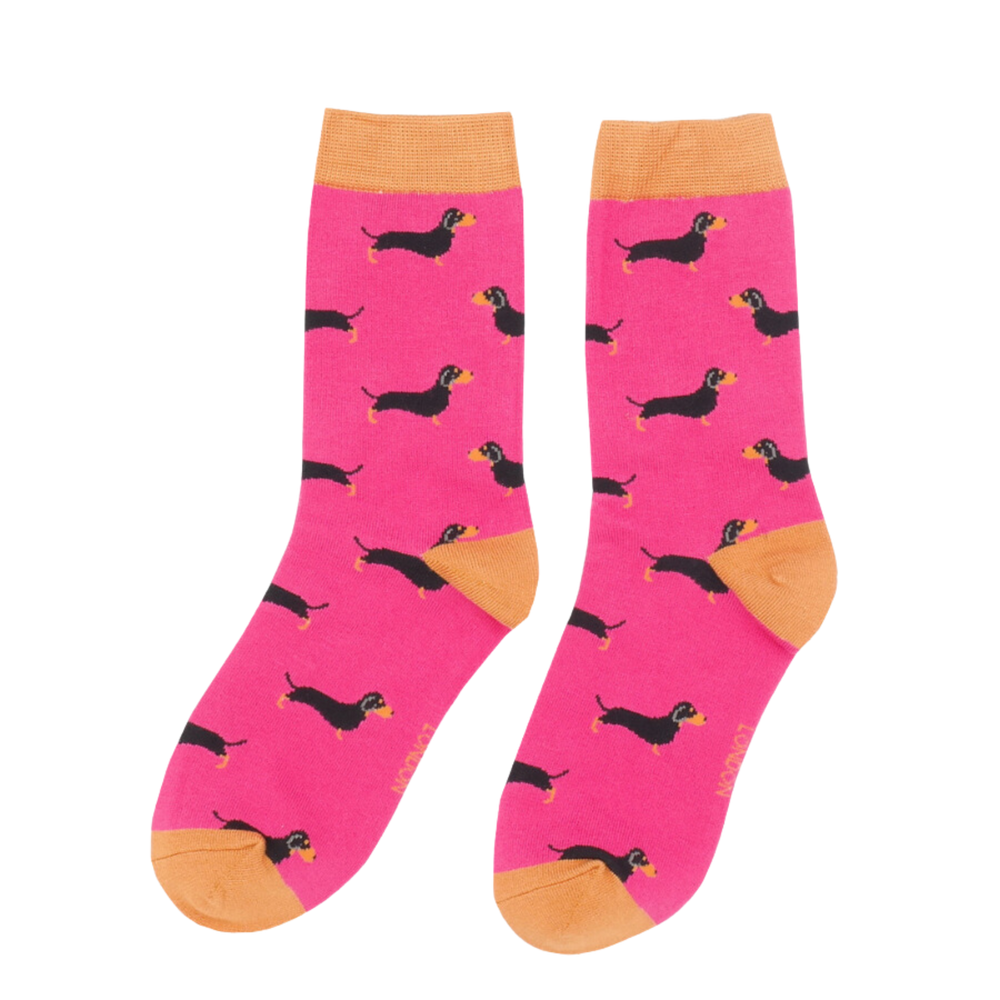 
                  
                    A pair of socks featuring a sausage dog pattern. Hot pink legs, orange cuffs, heel and toe.
                  
                