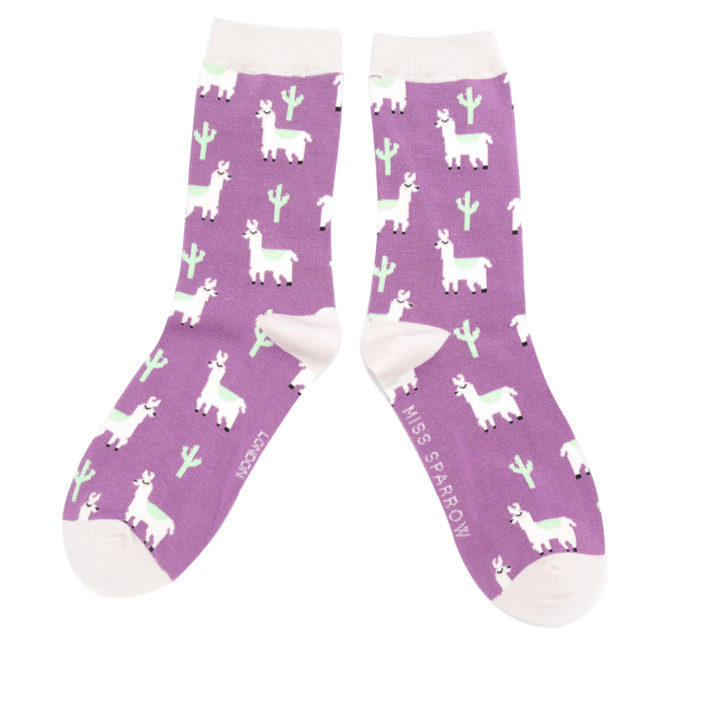 Llama & Cactus Bamboo Socks - Miss Sparrow. A pair of socks depicting cacti and Llamas. Pink legs, white cuff, heel and toe. 