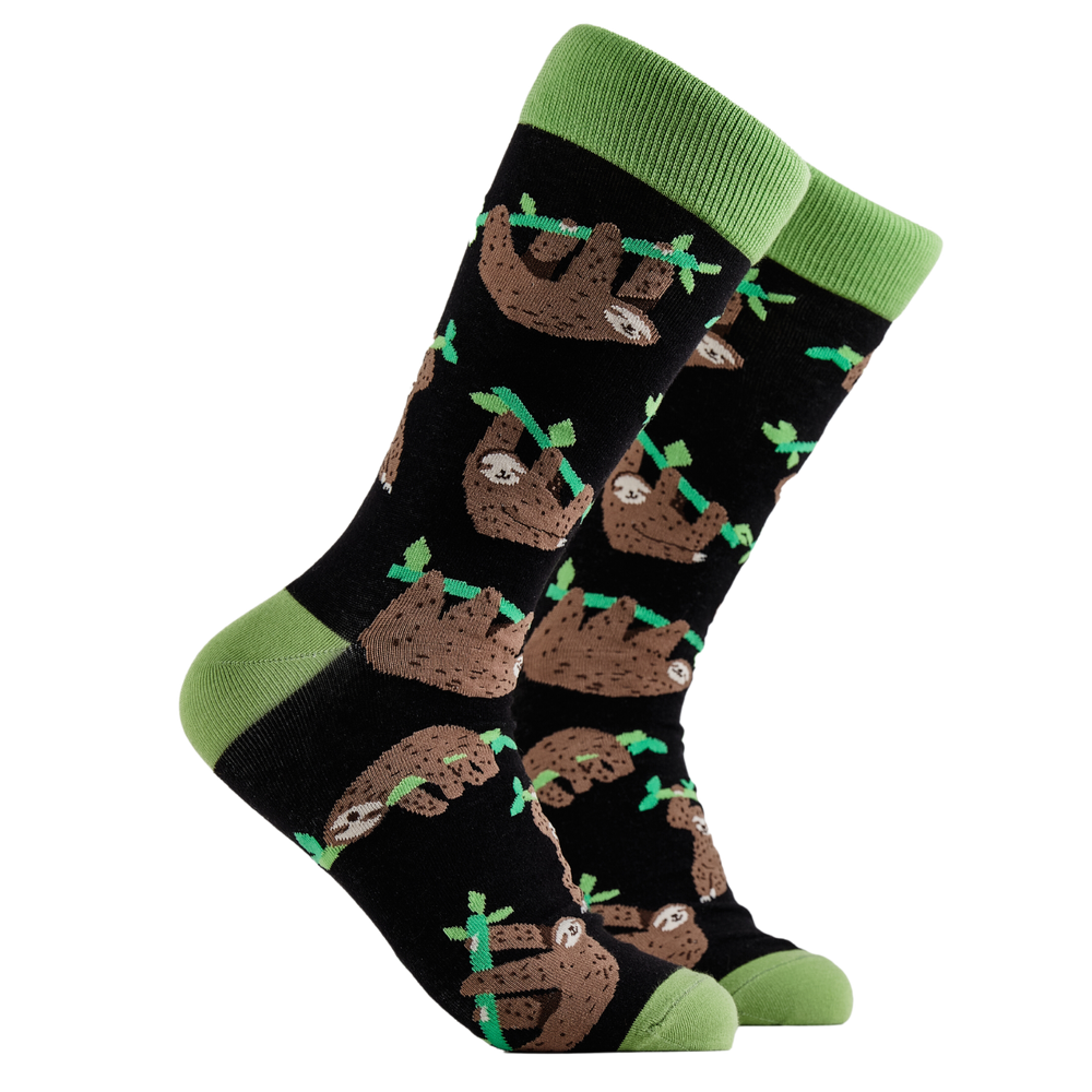 Sloth Socks - Lazy Vibes. A pair of socks depicting lazy sloths. Black legs, green cuff, heel and toe.