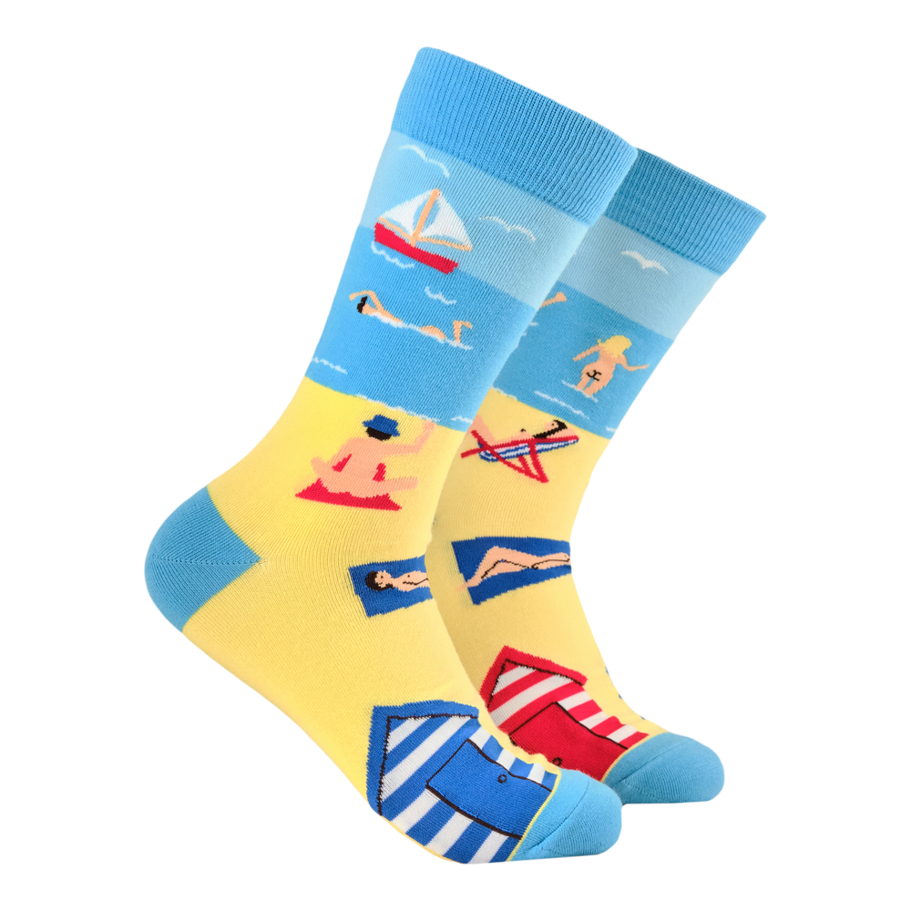 
                      
                        Life's a Beach Socks. A pair of socks with a fun beach design. Blue heel, toe and cuff. 
                      
                    