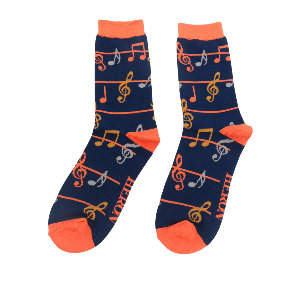 
                  
                    Multicolour Music Notes Bamboo Socks - Miss Sparrow. A pair of socks with a music note pattern. Dark Blue legs, orange cuffs, heel and toe.
                  
                