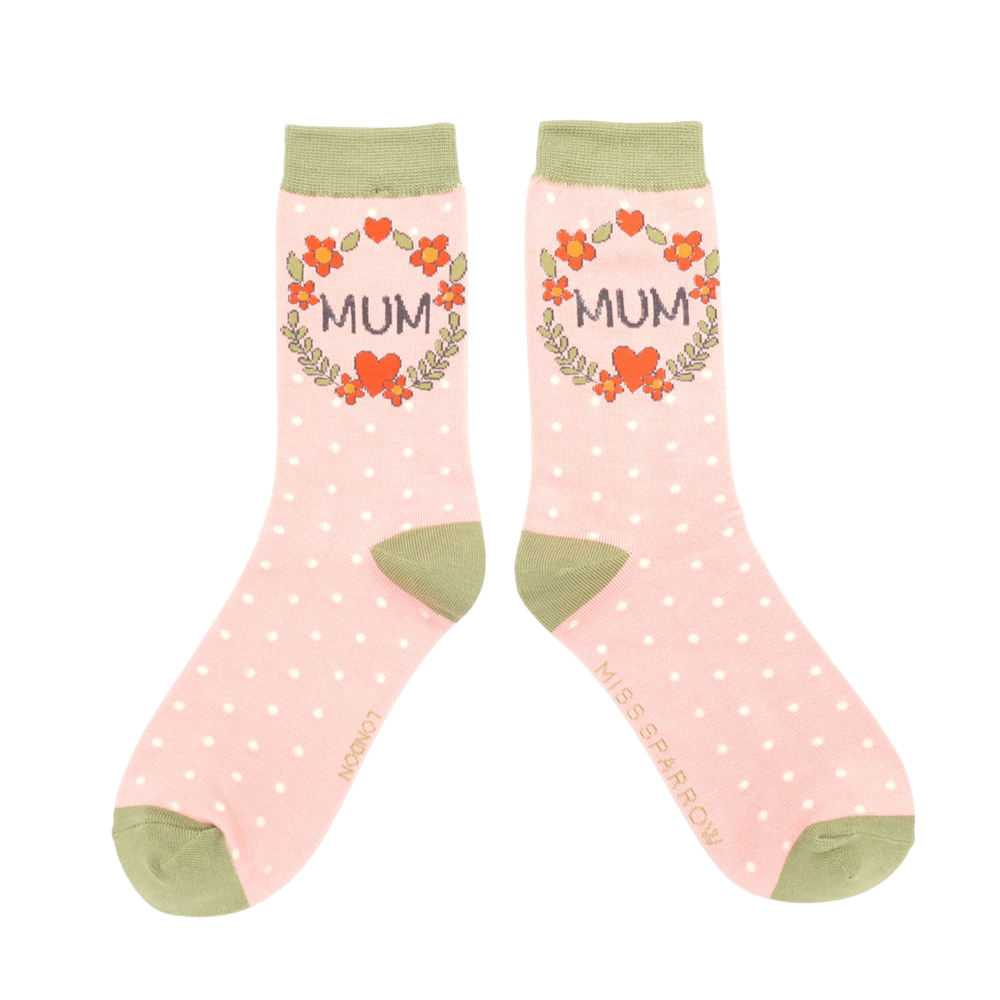 
                      
                        Mum Floral Wreath Bamboo Socks - Miss Sparrow. A pair of socks with a floral wreath Mum motif. Pink legs, light green cuff, heel and toe. 
                      
                    