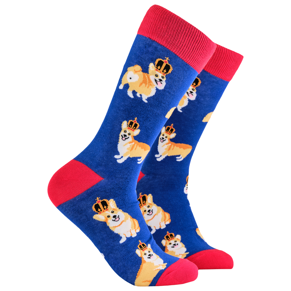 Majestic Corgi Socks. A pair of socks depicting corgis wearing crowns. Blue legs, red cuff, heel and toe.