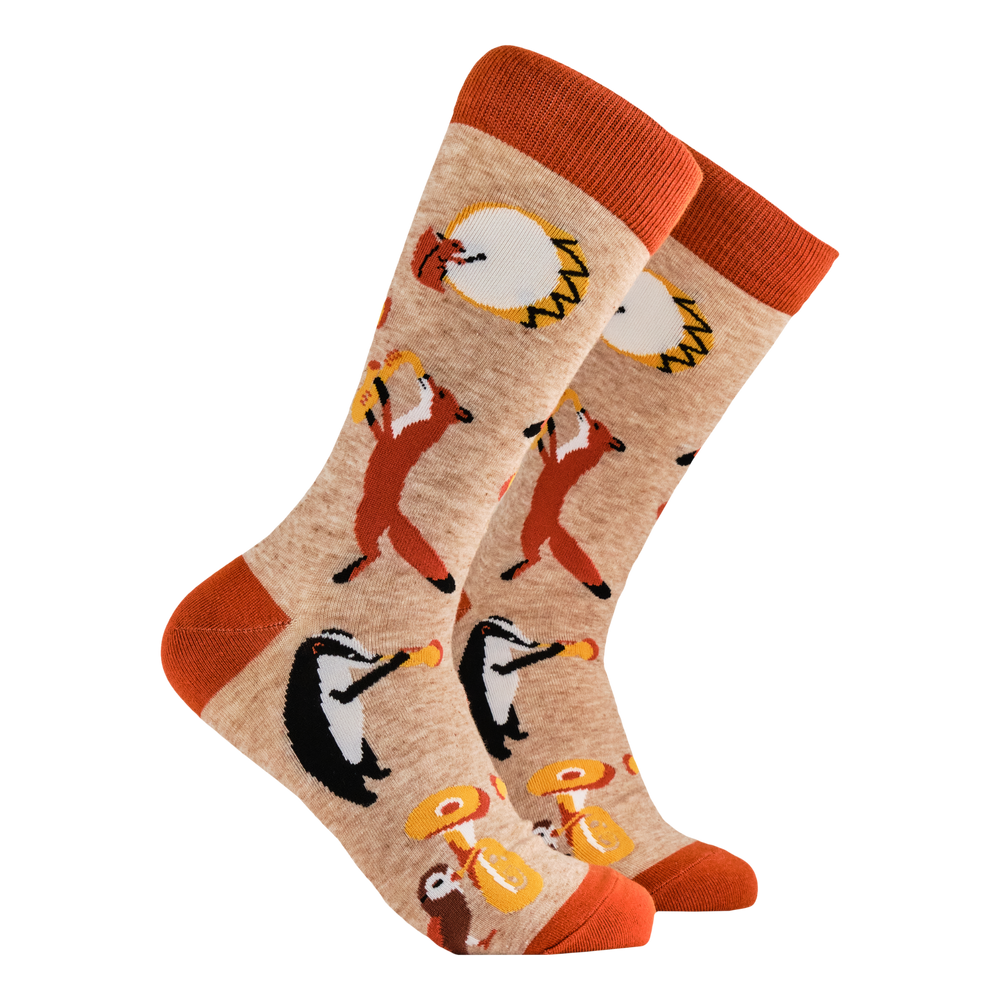 Forest Animals Socks - Marching Bands. A pair of socks featuring some woodland creatures playing musical instruments. Brown legs, orange cuff, toe and heel. 