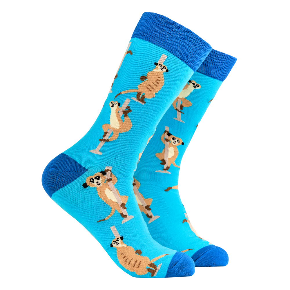 Meerkat Pole Dancer Socks. A pair of socks featuring pole dancing meerkats. Light blue legs, dark blue heel, toe and cuff. 