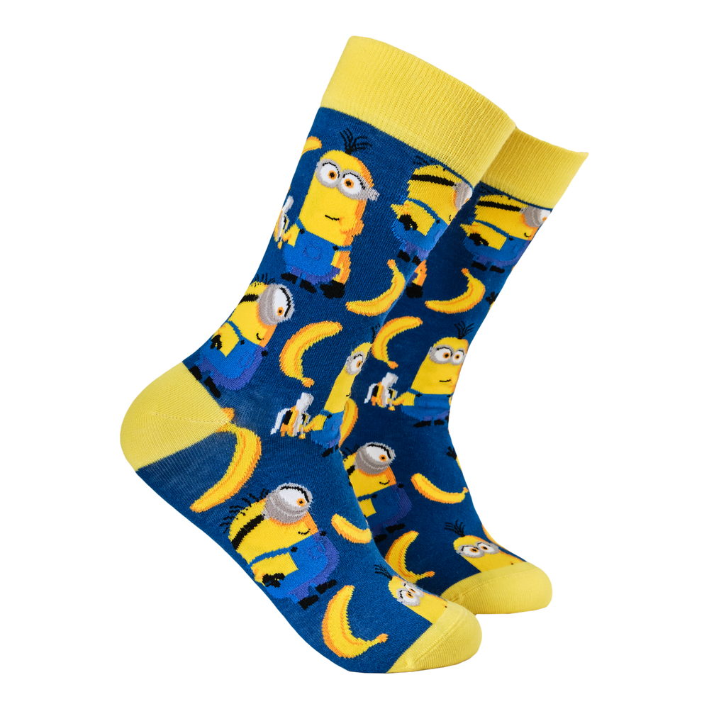 
                      
                        Minions Socks. A pair of socks depicting the minions. And bananas. Blue legs, yellow heel toe and cuff. 
                      
                    