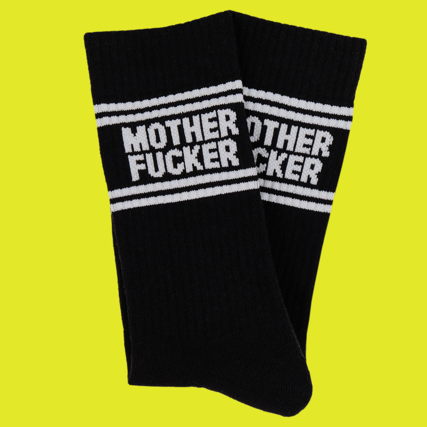 
                  
                    A black pair of athletic socks with white trim on the ankles and toes. With a very rude insult involving mothers on the ankle.
                  
                