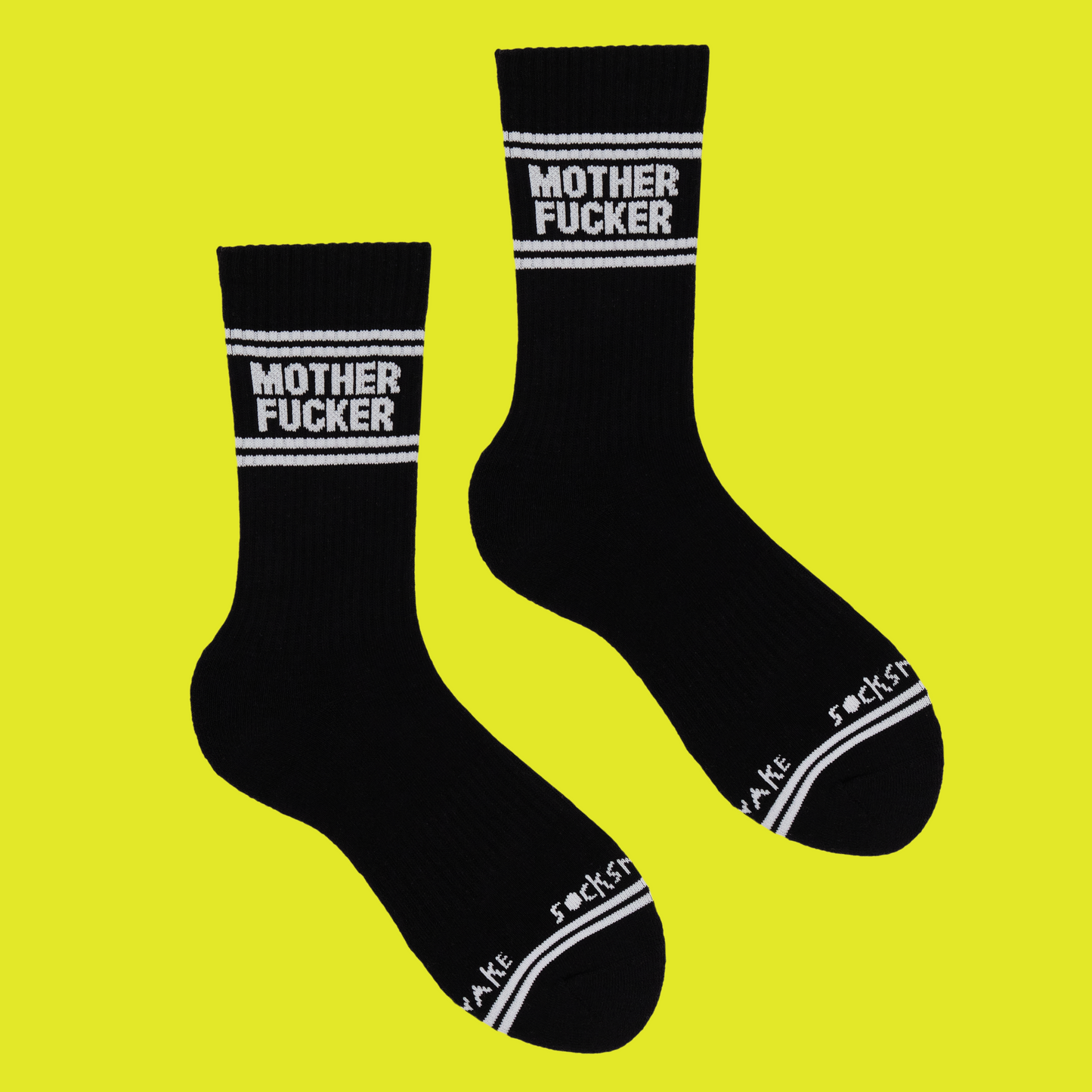 
                  
                    A black pair of athletic socks with white trim on the ankles and toes. With a very rude insult involving mothers on the ankle.
                  
                