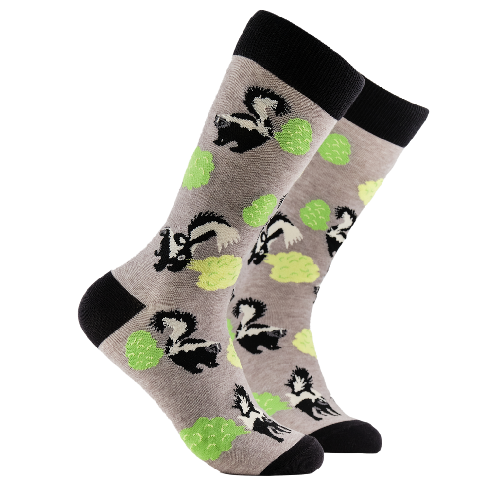 Skunk Socks - Mr Stink. A pair of socks depicting stinky skunks. Grey legs, black cuff, heel and toe.