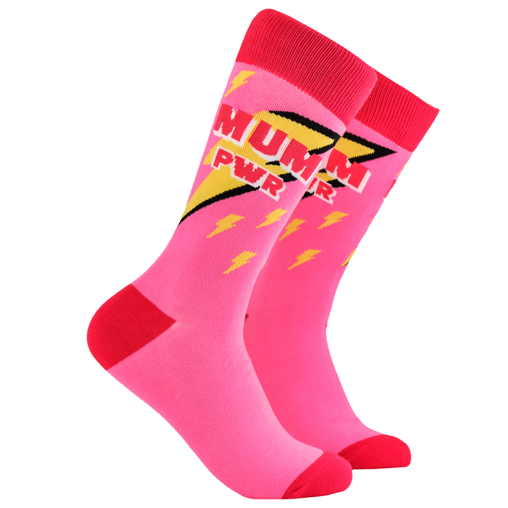 Mum Power Socks. A pair of socks depicting lightning bolts and the words MUM PWR. Pink legs, red cuff, heel and toe.