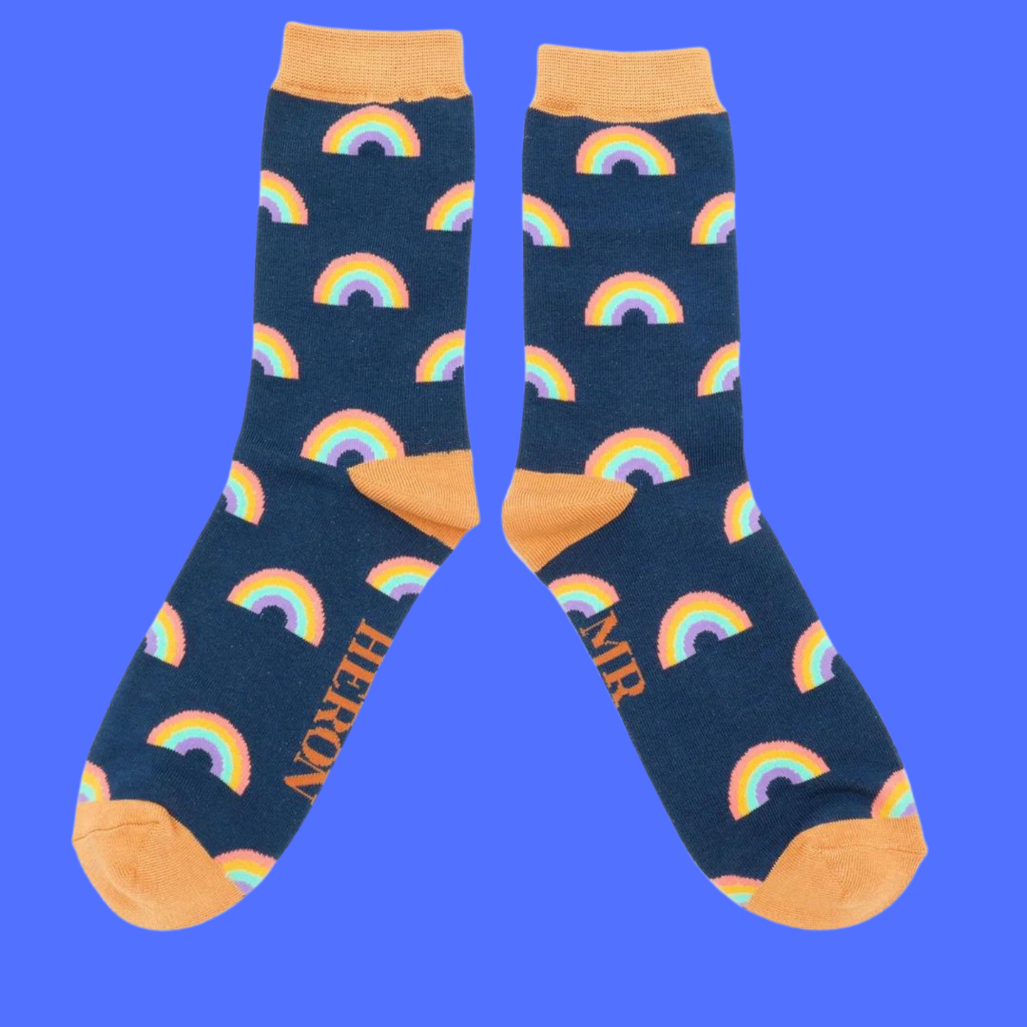 
                  
                    A pair of socks with a rainbow pattern. Dark blue legs, orange cuff, toe and heel.
                  
                