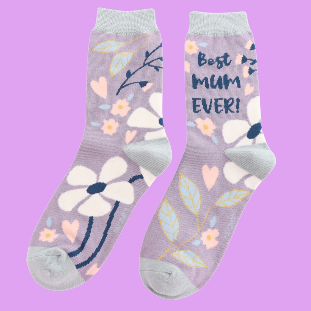 
                      
                        A pair of socks with a floral motif and best mum ever slogan. Purple legs and grey heel toe and cuff. 
                      
                    