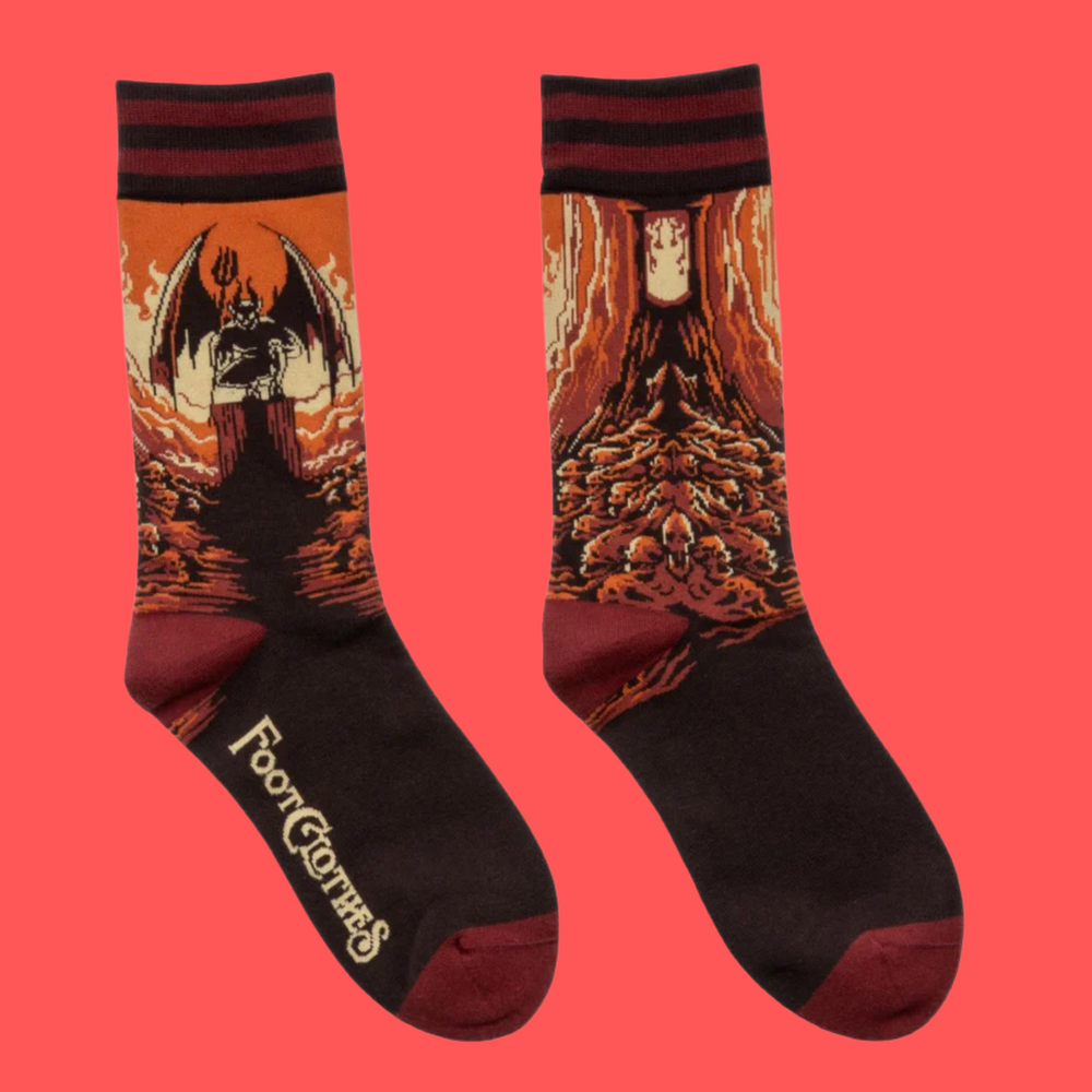 
                      
                        A pair of socks featuring a devil on a pile of skulls. Brown legs, red heel, toe and cuff. 
                      
                    