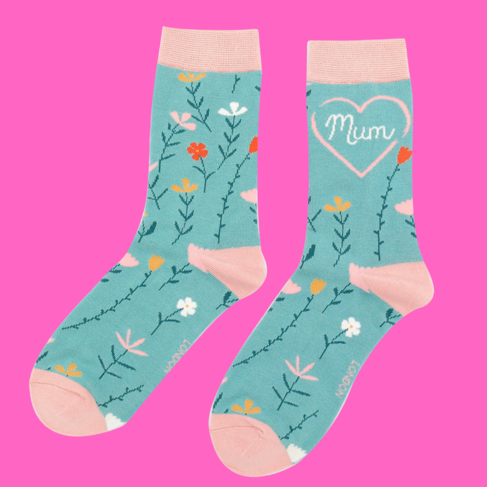 
                      
                        A pair of socks with a floral motif and mum slogan. Teal legs, pink heel, toe and cuff. 
                      
                    