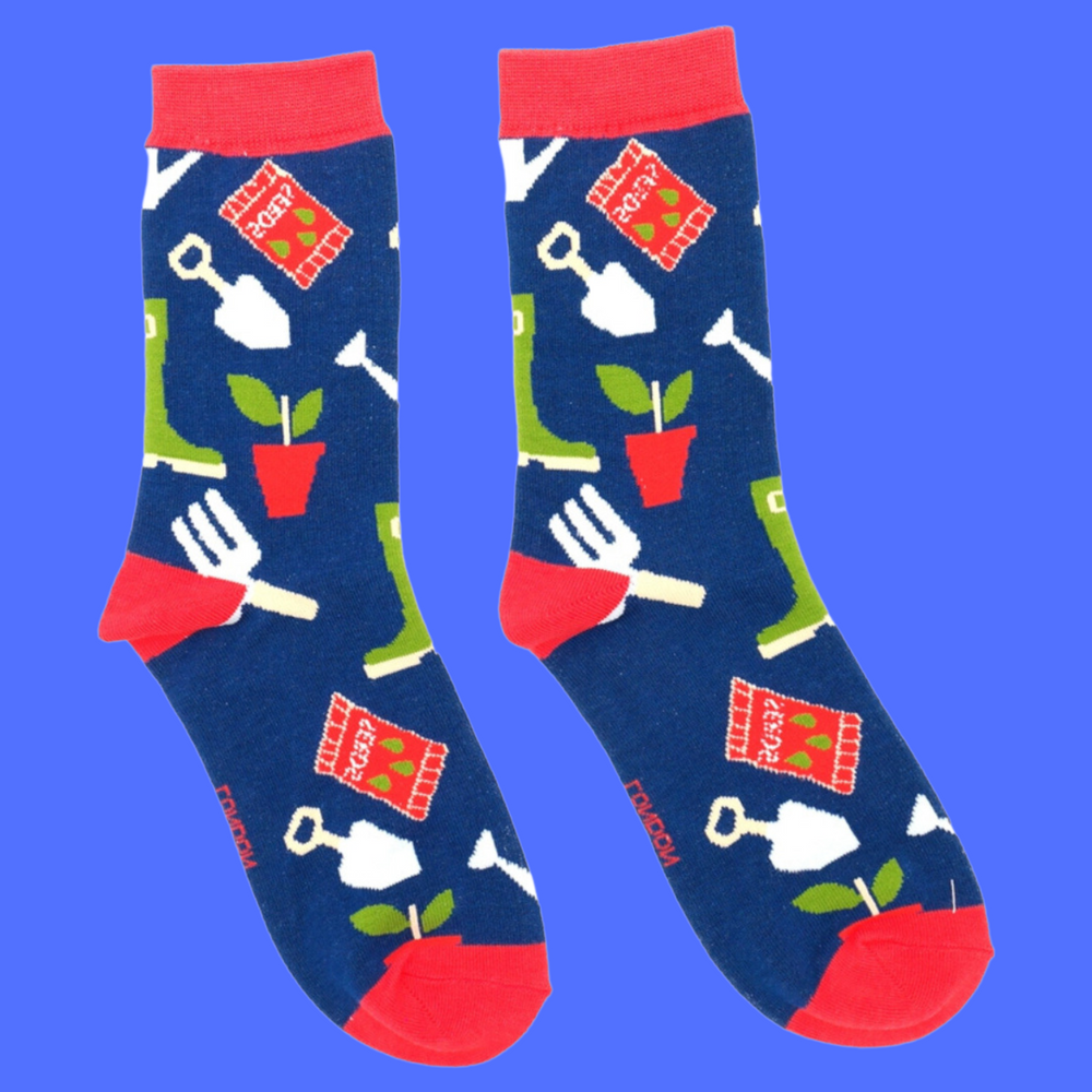 
                      
                        A pair of socks featuring gardening tools. Dark blue legs, red heel, toe and cuff. 
                      
                    