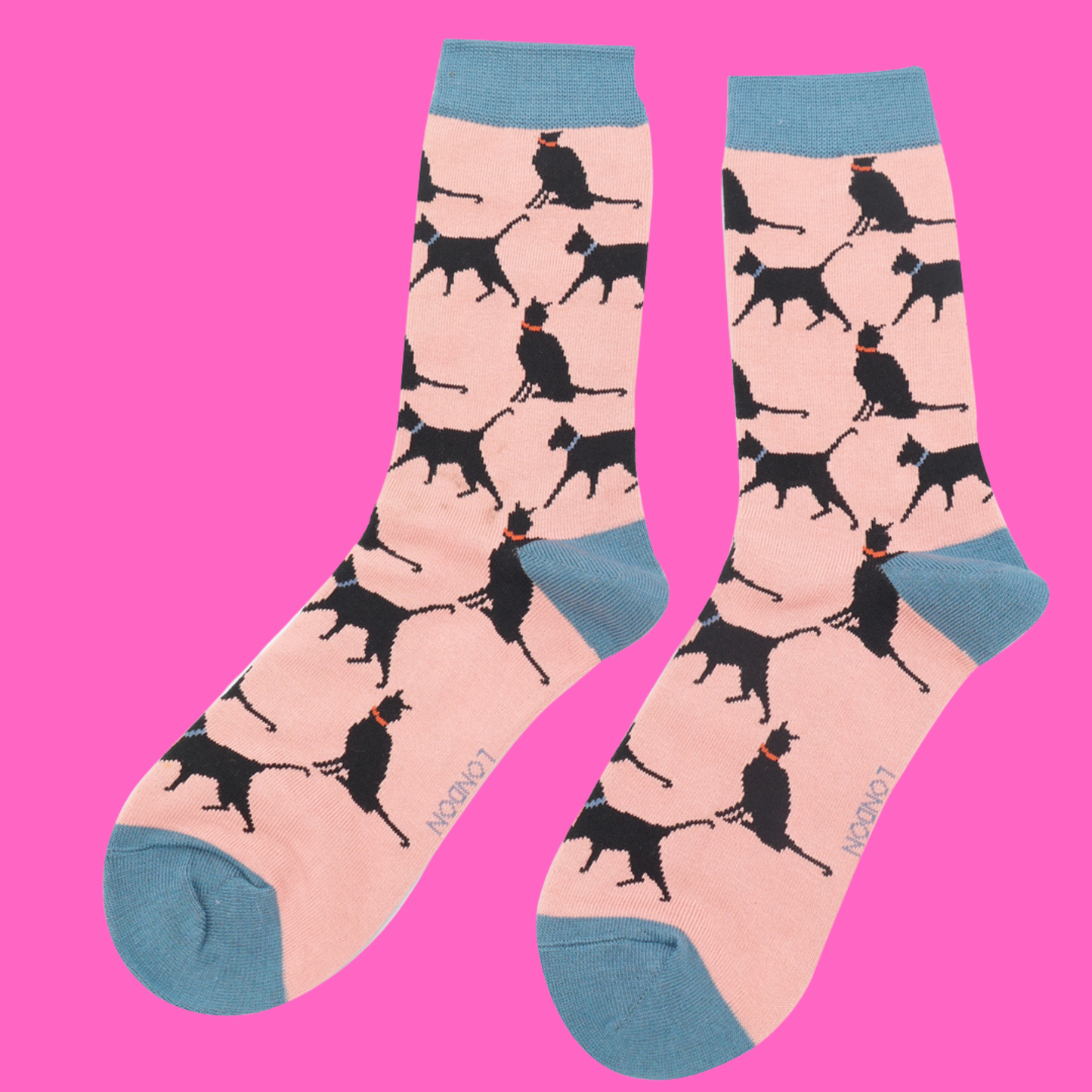 
                  
                    A pair of socks depicting lucky black cats. Pink legs, blue heel, toe and cuff.
                  
                