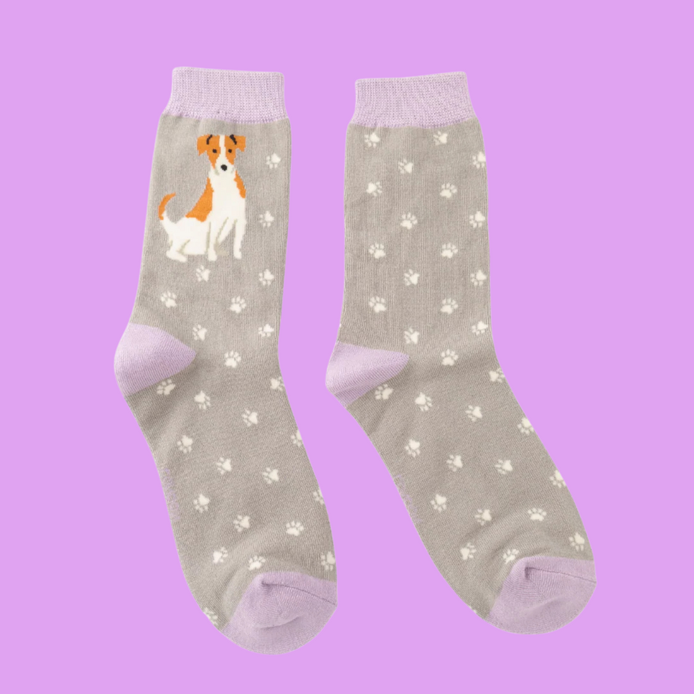 
                      
                        A pair of socks featuring a cute jack russell. Grey legs, pink heel, toe and cuff. 
                      
                    