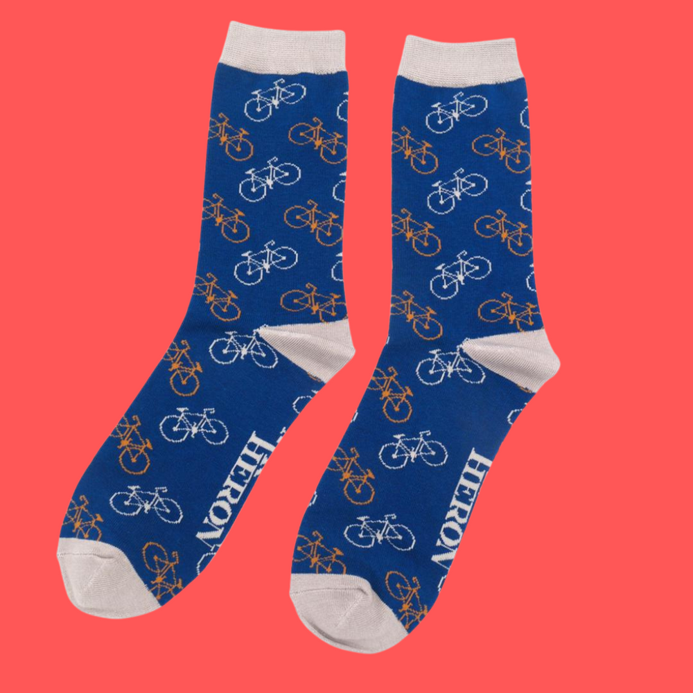 
                  
                    A pair of socks depicting bicycles. Blue legs, grey heel, cuff and toes.
                  
                