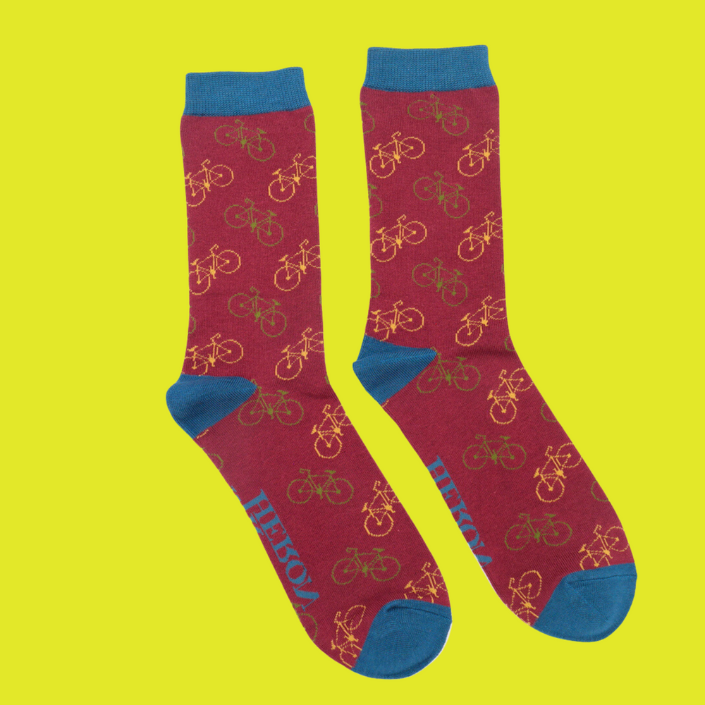 
                      
                        A pair of socks depicting bicycles. Red legs, blue heel, cuff and toes.
                      
                    