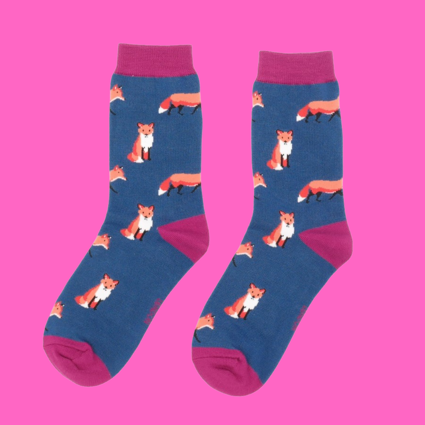 
                  
                    A pair of socks featuring a cute fox design. Dark Blue legs, pink cuff, heel and toe.
                  
                