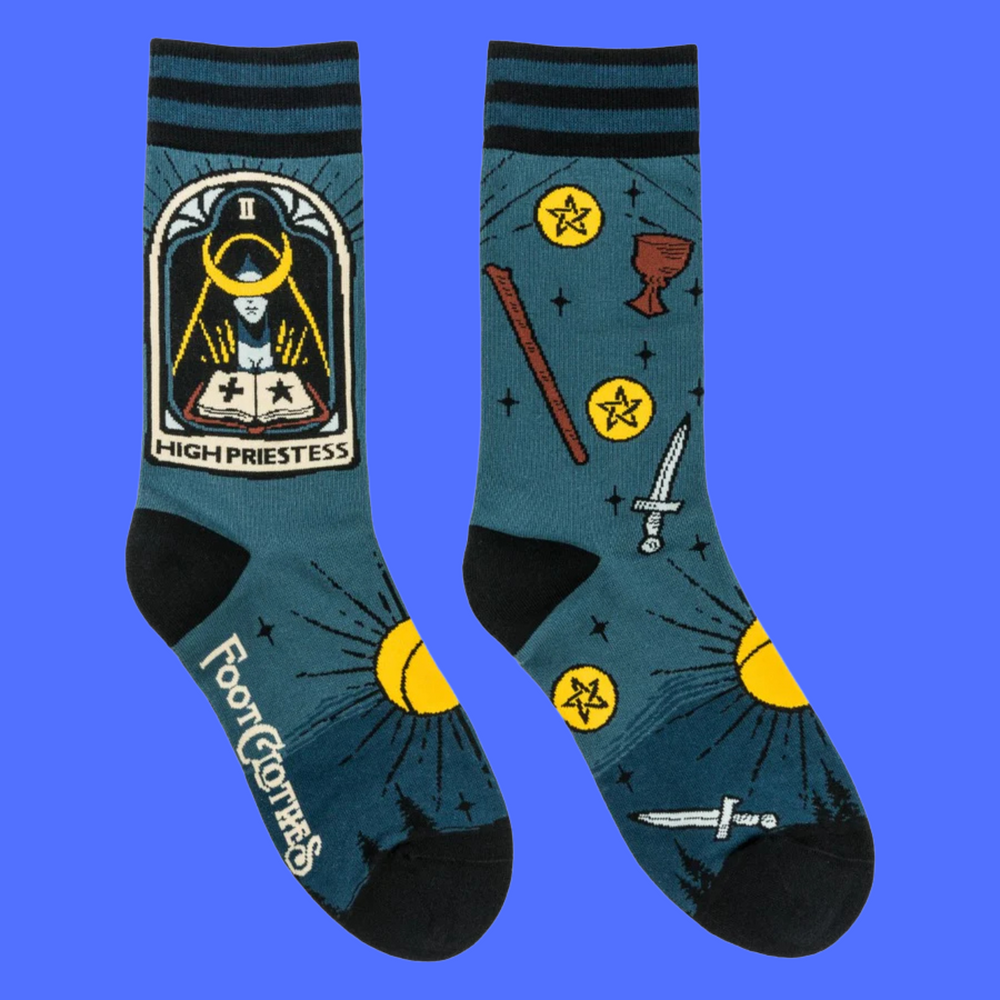 
                      
                        A pair of socks featuring the high priestess tarot card. Green legs, black heel, toe and cuff. 
                      
                    