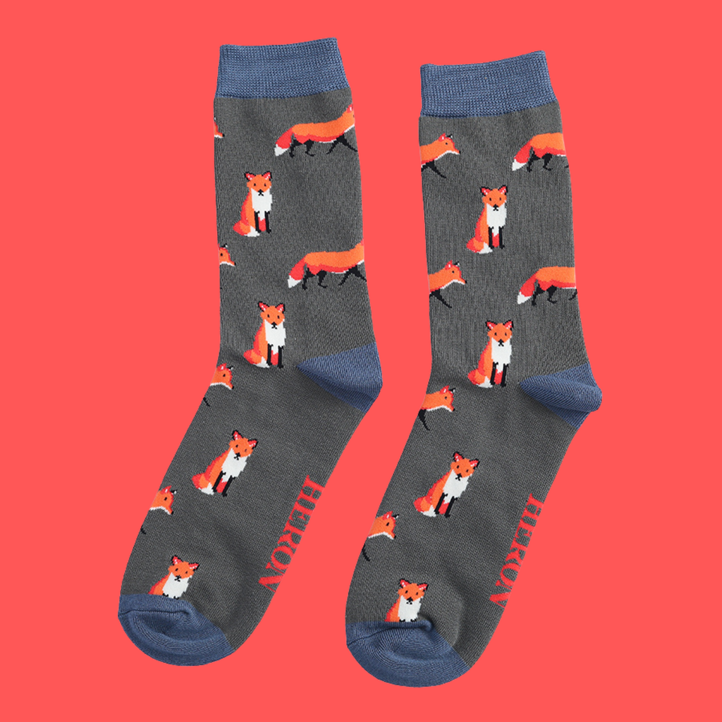 
                  
                    A pair of socks featuring a cute fox design. Grey legs, dark cuff, heel and toe.
                  
                