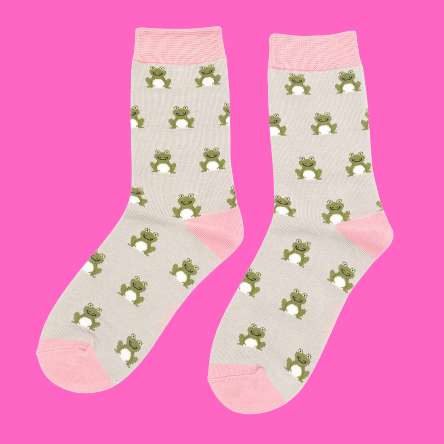 
                  
                    A pair of socks depicting happy frogs. Light grey legs, pink cuff, heels and toes.
                  
                