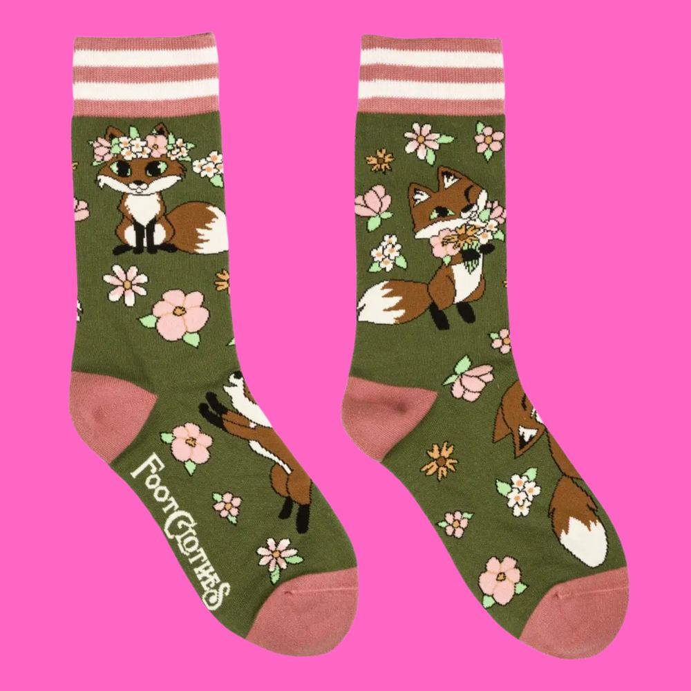 
                      
                        A pair of socks featuring cute woodland foxes. Green legs, pink heel, toe and cuff. 
                      
                    