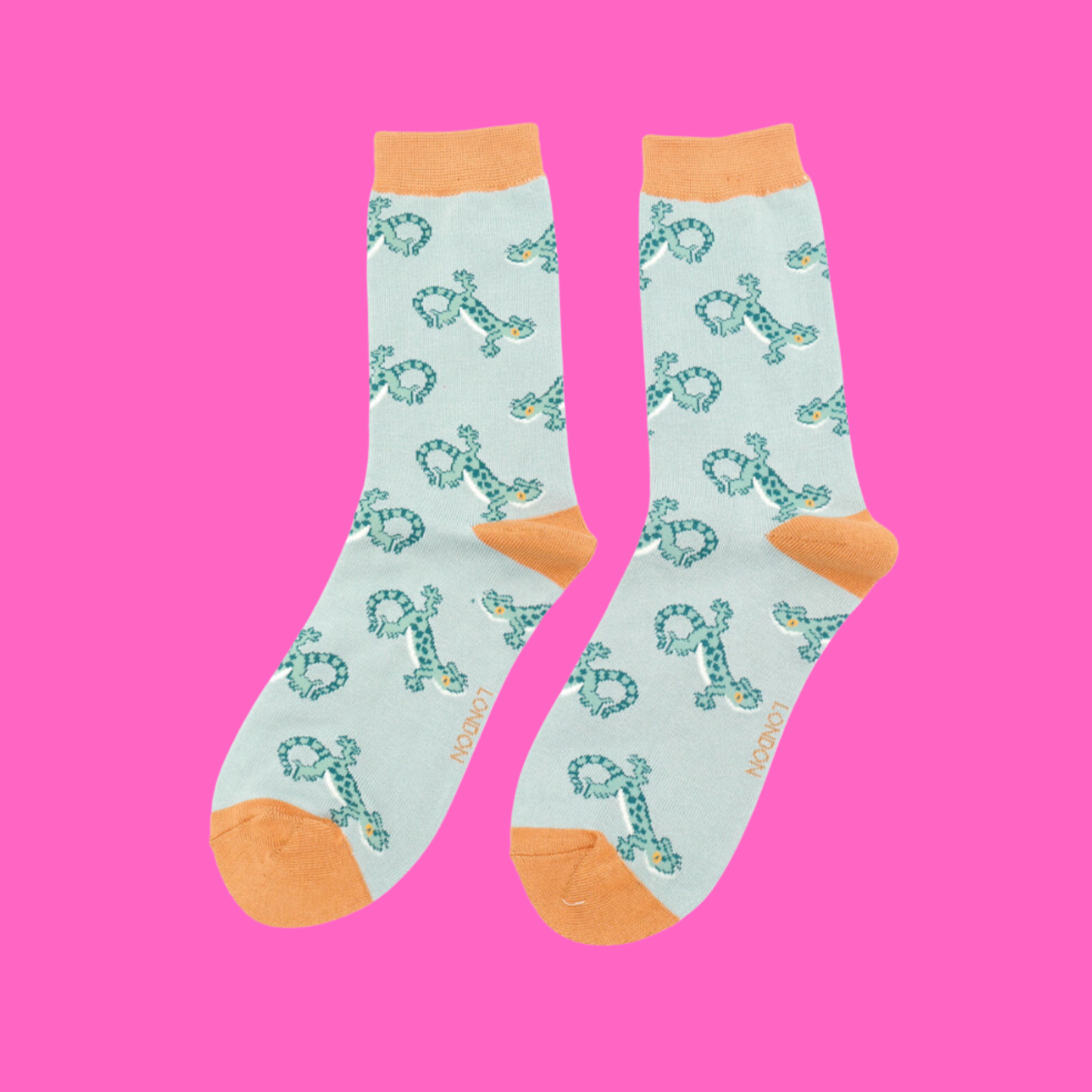 
                  
                    A pair of socks with a lizard pattern. Turquoise legs, orange heel, cuff and toe.
                  
                