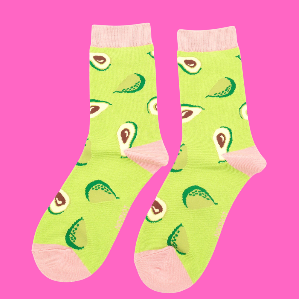 
                  
                    A pair of socks depicting avocados. Green legs, pink heel, cuff and toe.
                  
                