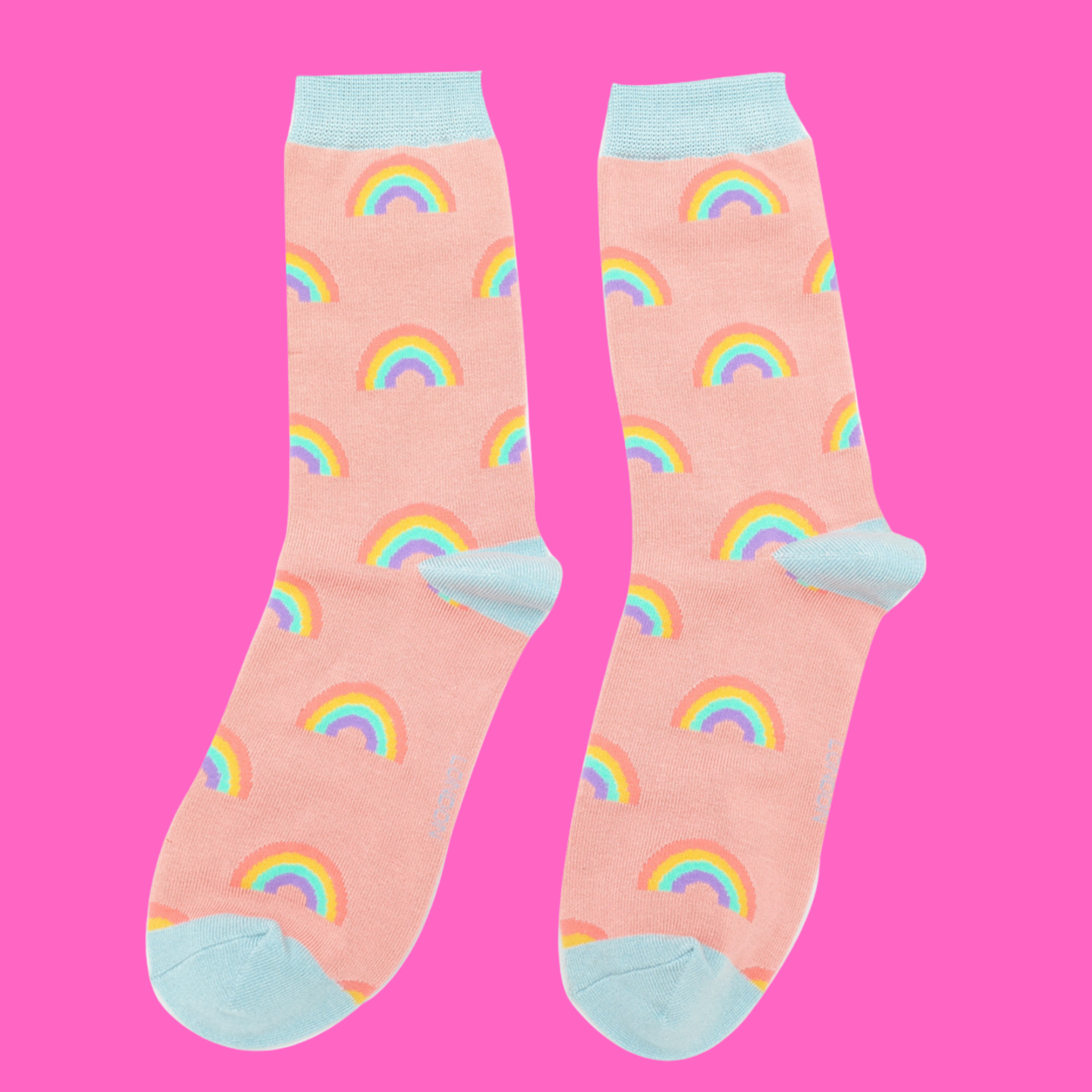 
                  
                    A pair of socks with a rainbow pattern. Peach legs, light blue cuff, toe and heel.
                  
                