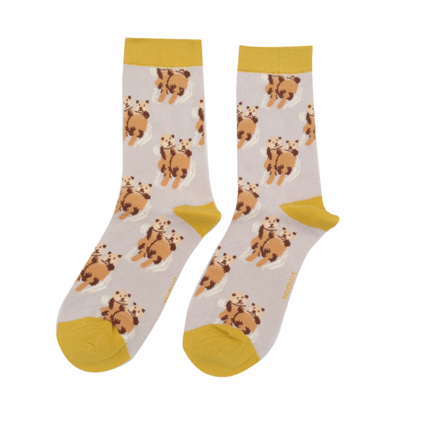 
                  
                    A pair of socks depicting otters holding hands. Cream legs, yellow heel, toe and cuff.
                  
                