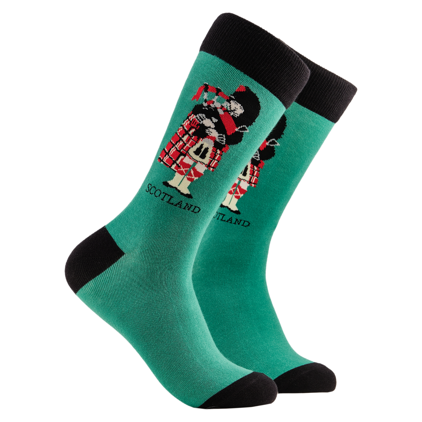 Scottish Socks - Piper. A pair of socks depicting a scotsman playing bag pipes. Green legs, black cuff, heel and toe.