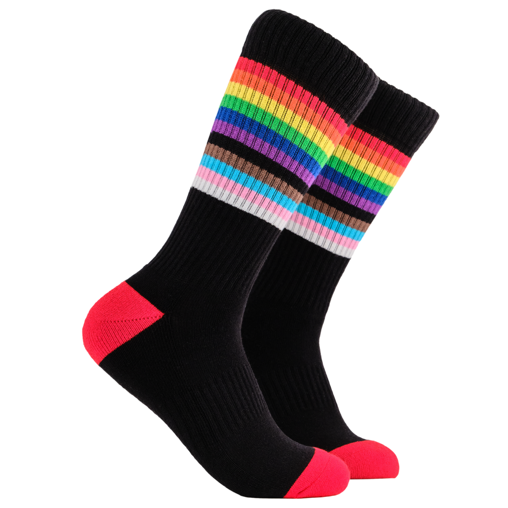 
                      
                        A pair of socks depicting the pride flag. Black legs, black cuff, red heel and toe.
                      
                    