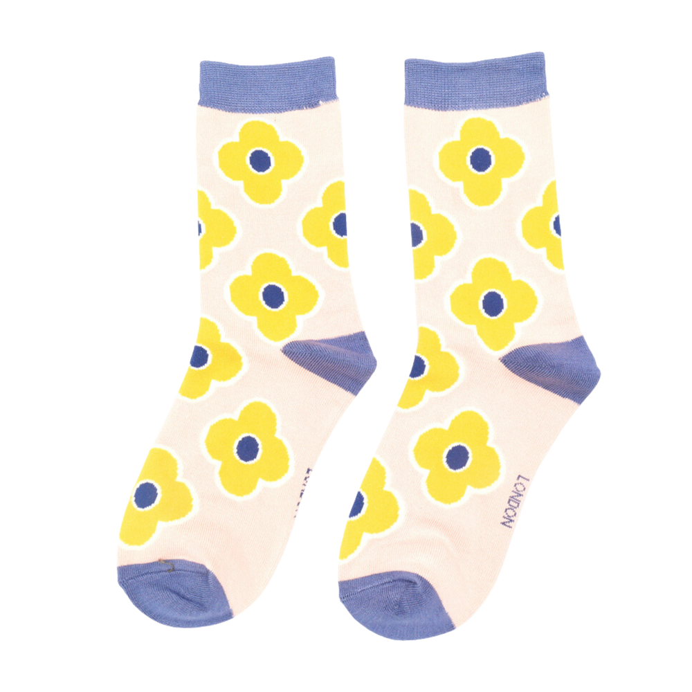 
                  
                    Retro Flowers Bamboo Socks - Miss Sparrow. A pair of socks depicting a retro flower pattern. Cream legs, light blue heel, toe and cuff.
                  
                