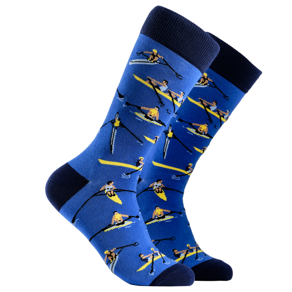 Rowing Socks. A pair of socks depicting row boat racers. Blue legs, dark blue cuff, heel and toe.