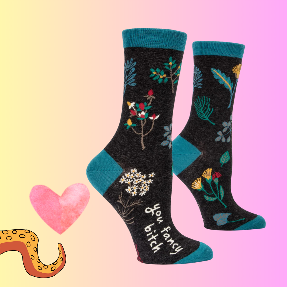 A pair of socks with a floral motif. Black legs, blue heel, toe and cuff. 