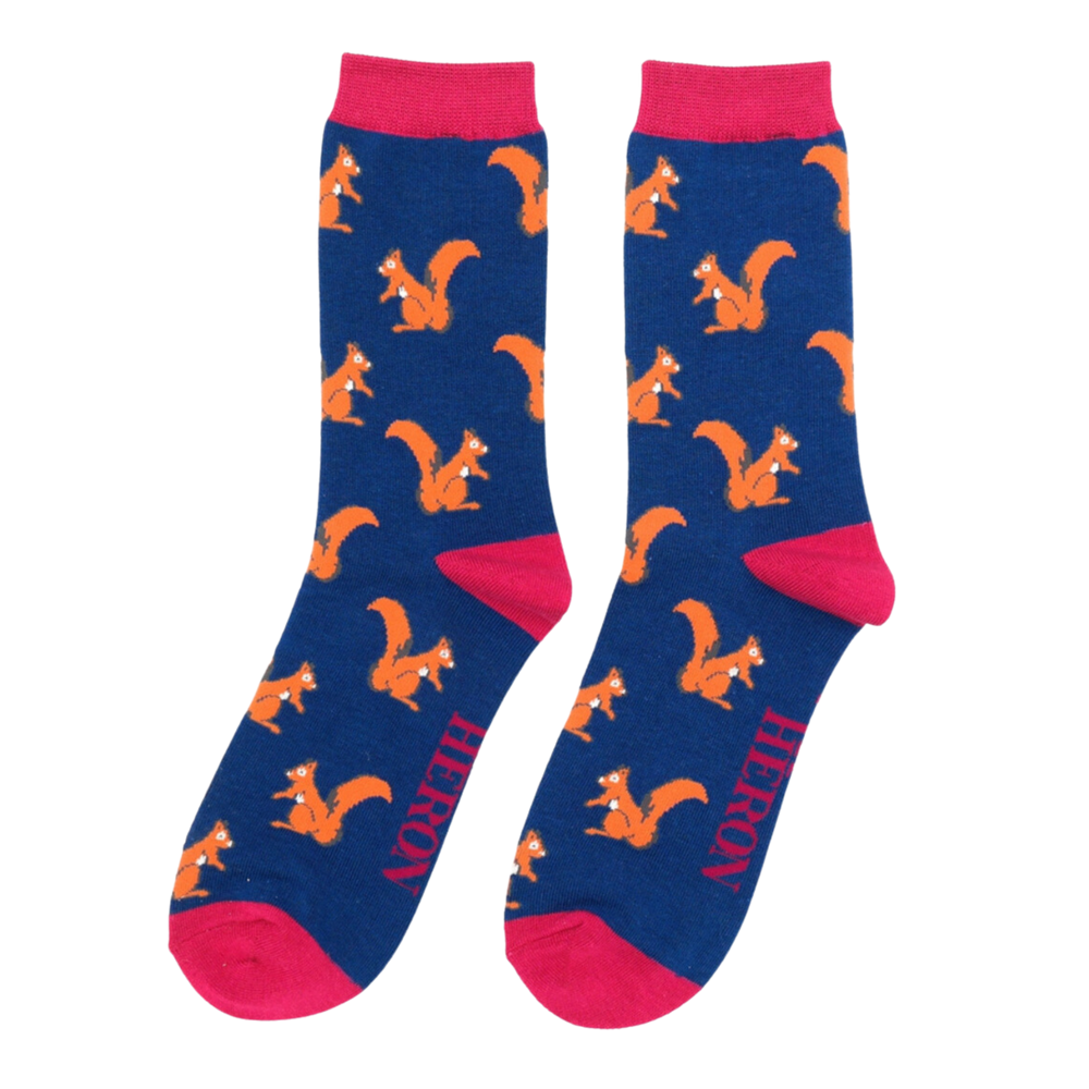 A pair of socks with a squirrel motif. Blue legs, pink cuff, heel and toe.